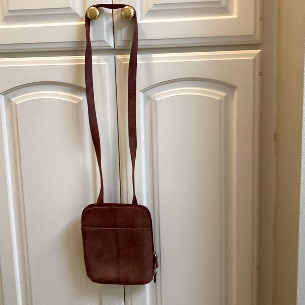 J.Jill Cross zippered body bag. Never used. 7x8 . Brownish red.